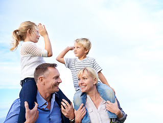 Image showing Smile, piggy back and parents with children on blue sky for outdoor adventure together, vacation and high five. Relax, sunshine and family, happy kids with mom and dad on summer holiday with support.