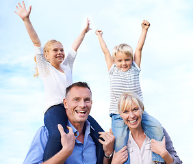 Image showing Portrait, piggy back and parents with children on outdoor adventure, vacation or excited on blue sky. Relax, sunshine and family, happy kids with with mom and dad on summer holiday fun with smile.