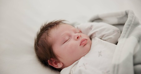 Image showing Baby, sleeping and nursery room bed with morning, nap and dreaming of a young newborn at home. Cozy, sleepy kid and calm with health development from rest and peace in a house with closeup and care