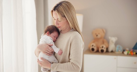 Image showing Sleeping, love and mother with baby in home for bonding, relationship and child development together. Newborn, motherhood and mom carry asleep infant for care, dreaming and affection in nursery room