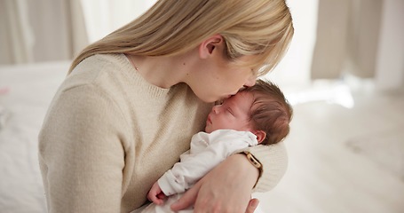 Image showing Family, kiss and a mom rocking her baby to sleep in the bedroom of their home together for love or care. Dreaming, nap or tired with a mama and newborn infant in an apartment to rest for growth