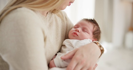 Image showing Family, kiss and a mom rocking her baby to sleep in the bedroom of their home together for love or care. Dreaming, nap or tired with a mama and newborn infant in an apartment to rest for growth