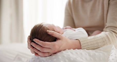 Image showing Newborn baby, mother and hands on hair with love to touch, mama connection and safety on bed. Motherhood, infant and trust bond with care in child growth, support and relax together in family home