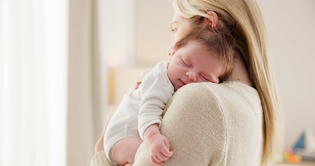 Image showing Care, love and mother with baby for bonding, relationship and child development together at home. New born, motherhood and happy mom carry infant for sleeping, support and affection in nursery room