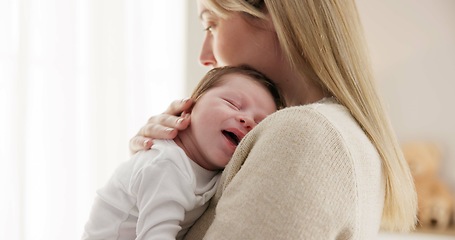 Image showing Love, mother and baby in nursery for sleeping, bonding and touch or cuddle with support or care. Woman, mom or holding newborn in bedroom with bond and relax for child development and nurture in home