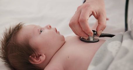 Image showing Baby, stethoscope and doctor listening to heart, breathing and test kids healthcare in clinic. Infant, heartbeat and hand of pediatrician examine patient, chest and check cardiology health of lungs