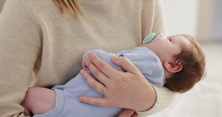 Image showing Mother, relax baby and nap with love, care and support for newborn in nursery with sleep. Young child, mom and family with youth and childcare with bonding and maternity in home with infant and calm