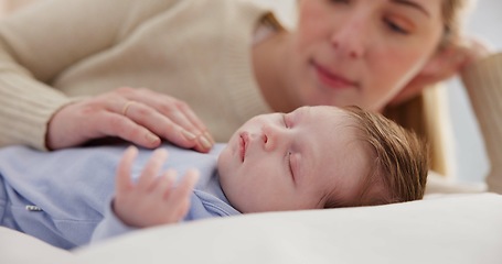 Image showing Family, love and a mama on the bed with her baby for sleep, rest or bonding together in a home. Children, bedroom and a single mom in an apartment with her newborn infant to relax for care or growth