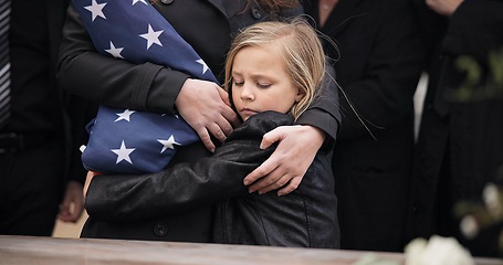 Image showing Sad, hug and a child at a funeral or graveyard for a ceremony or death with family. Depression, young and a girl kid with a person for comfort at a cemetery for mourning, grief together or loss