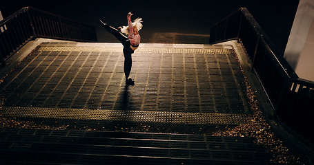 Image showing Japanese woman, city and dancing on stairs, moving body and freedom for street performance in night. Girl, dancer or person with art, concert and steps with creativity, vision and balance in Tokyo