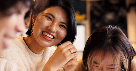 Image showing Japanese friends, laughing and talking in restaurant for dinner, vacation and hungry to order healthy food. Women, man or happy together on lunch in tokyo city or funny joke by bonding in coffee shop