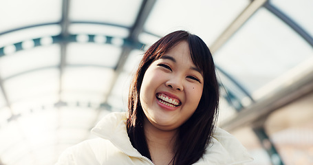 Image showing Bridge, happy and face of Japanese woman in city on commute, travel and journey in metro. Portrait, fashion and person with trendy clothes or casual style for adventure, holiday and vacation in town