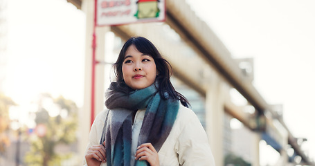 Image showing Travel, thinking and walking with woman, ideas and Japan with student, decision and peaceful. Person, outdoor and girl with choice, opportunity and relax with joy, calming and smile in a street