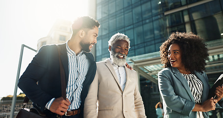 Image showing Business people, outdoor and walking with conversation, teamwork and New York city with professionals. Corporate, urban town and group with ideas, lens flare and summer with with cooperation and talk