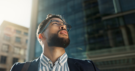 Image showing Businessman, vision and city in travel for opportunity, dream job or career ambition outside building. Face of man or employee thinking with business mindset for outdoor inspiration in an urban town