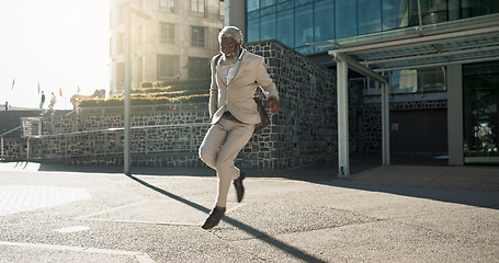 Image showing Senior business man, dancing and street for celebration, goals or happy with career achievement. Elderly African entrepreneur, CEO or dancer with moving, steps or smile for profit at job in Cape Town