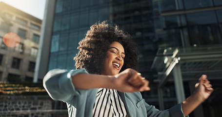 Image showing Happy, dance and business woman in the city with job promotion celebration and positive attitude. Smile, excited and professional young female person moving for good news with career in urban town.