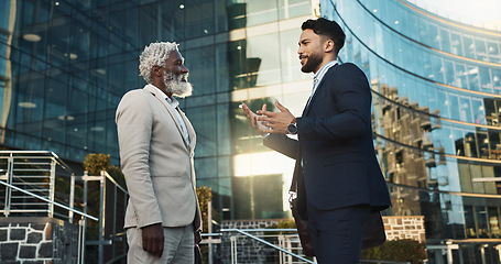 Image showing Business men, friends and walk in street, check watch and ready for meeting, schedule or happy in city. Partnership, time management and direction to workplace with discussion, road or metro sidewalk