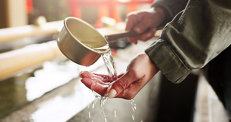 Image showing Shinto shrine, washing hands and fountain with water in container for faith, cleaning and wellness. Religion, culture and praise with ladle for purification ritual in woods, peace or temple in Kyoto