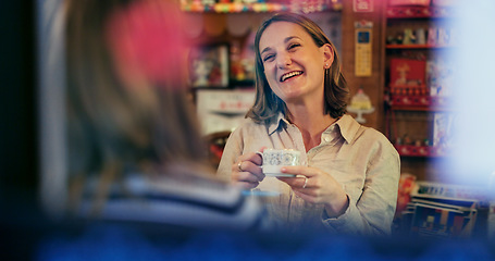 Image showing Friends, coffee shop and funny with women, smile and conversation with happiness, bonding together and laughing. Cafe, people and girls with tea, humor and chilling with joy, cheerful and talking