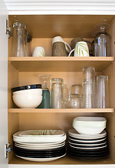 Image showing Dishes in the Cupboard