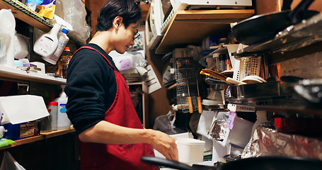 Image showing Japanese chef man, cooking and kitchen by stove, service or catering job on pan, pot and ready. Person, restaurant or cafeteria with chopsticks for meal prep, working or thinking for recipe in Tokyo