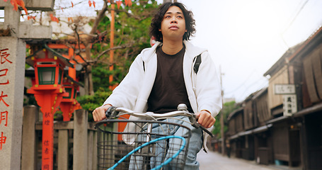 Image showing Bicycle, travel and man riding in the city for exercise or transportation to college academy. Fitness, backpack and young male student driving a bike to university for carbon footprint in urban town.