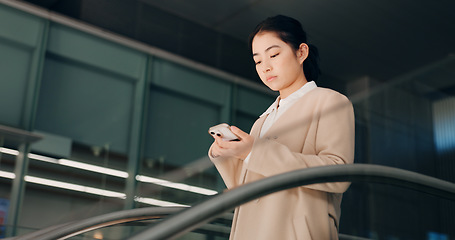 Image showing Japanese, escalator and travel with businesswoman, phone or social media with internet, employee or convention. Person, consultant or worker with airport, communication or connection with mobile app