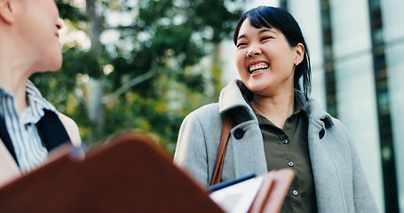 Image showing Walking, city and Japanese business women with smile chat for morning commute, journey and travel. Professional, corporate and happy people in conversation in urban town for career, working and job