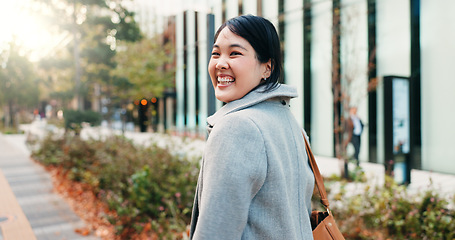 Image showing Walking, city and Japanese business woman with smile for morning commute, journey and travel to work. Professional, corporate and portrait of happy person in urban town for career, working and job