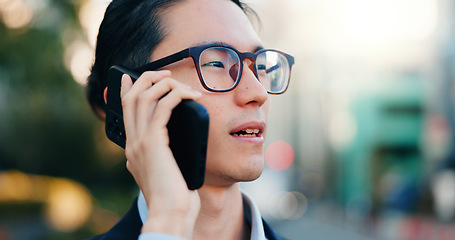 Image showing Phone call, city and face of business man consulting, networking and chat about news, report or negotiation. Cellphone, morning journey and Japanese consultant talking with contact on urban commute