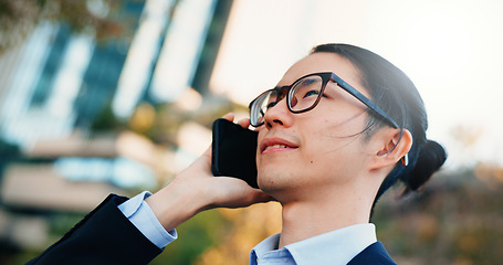 Image showing Phone call, city or face of professional man planning, networking and consulting with mobile user in negotiation. Cellphone, conversation or Japanese businessman talking with contact on urban commute