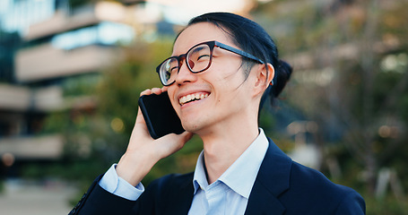 Image showing Phone call, city and business man laugh at funny feedback, discussion and chat about news, report or results. Smartphone, humour and happy face of Japanese agent talking with contact on urban commute