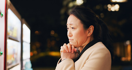 Image showing Woman, thinking and choice at vending machine for food or hot drink with in city at night. Shopping, automatic service and customer with click button and press on decision downtown in Tokyo Japan