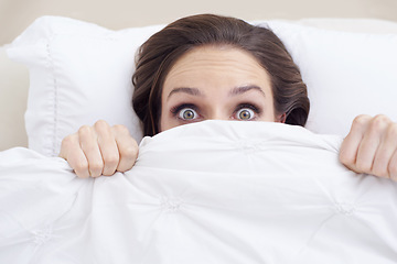 Image showing Morning, face of shocked woman in bed and blanket to wake up, relax and getting ready to start day. Pillow, portrait and girl in bedroom with rest, wellness and comfort in hotel, home or apartment.