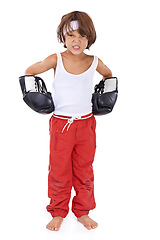 Image showing Boxing, fight and angry portrait of child in with courage for martial arts in white background. Challenge, boxer or kid with mma training in self defense, exercise or practice with gear in studio