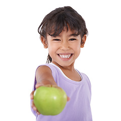 Image showing Girl, kid and apple for health and portrait, diet and vegan snack with nutrition and wellness on white background. Organic fruit, healthy food and vitamin c for balance and benefits in studio