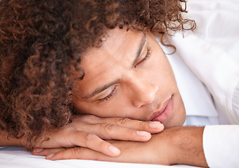 Image showing Sleep, face and man relax on bedroom for comfort, cozy nap and rest for stress relief in home apartment. Dream, exhausted and closeup of sleeping person lying on bed with burnout, tired or eye closed