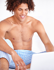 Image showing Man, laptop and relaxing in bed on technology, blog and subscription for movie at home. Male person, website and internet connection for online entertainment, search and scroll on streaming service