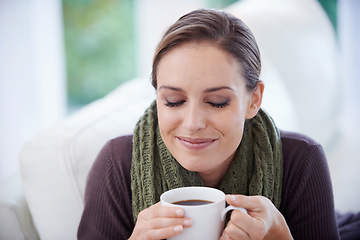 Image showing Woman, smell coffee and relax in apartment for comfort or morning routine with warm drink. Caffeine beverage, latte or espresso with peace and calm for chill at home with positive attitude and aroma