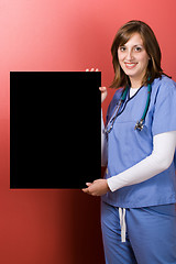Image showing Happy Nurse With Sign