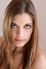 Image showing Confident, makeup and portrait of young woman with natural, glow and glamour facial routine. Beauty, cosmetics and serious attractive female person with self care, dermatology and face treatment.