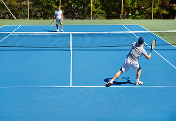 Image showing Tennis, match and men with fitness, sports and competition with training and cardio with a game. Players, friends and guys with rackets and court with workout and sunshine with challenge and practice