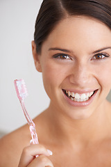 Image showing Toothbrush, smile and portrait of woman in bathroom for dental care, oral hygiene and cleaning. Healthcare, whitening and face of person brushing teeth with toothpaste for wellness and healthy mouth