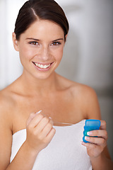Image showing Flossing, teeth and portrait of woman in bathroom of home with dental, self care and wellness. Cleaning, tooth and gums for oral healthcare in morning, routine or happy for hygiene or grooming