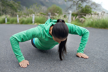 Image showing Push ups, woman and outdoor with fitness, wellness and active for endurance and training. Fresh air, person and athlete with challenge, mountains and freedom with practice, exercise and progress