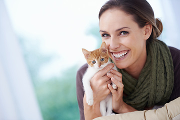 Image showing Happy, pet and portrait of woman with kitten in home for bonding, friendship and relax on sofa. Animal care, house and person with adorable, cute and young cat on couch for playing, embrace and love