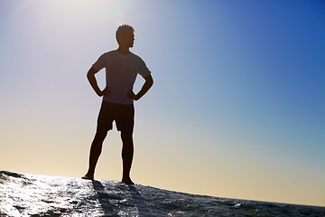 Image showing Man, horizon and sky with hiking in nature for adventure and fitness, mockup space and travel. View while trekking, journey and hiker outdoor with environment, sunrise color and exercise on mountain