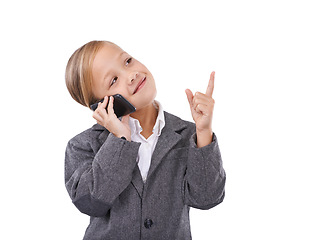 Image showing Child, phone call and business suit for play dress up in studio for future, connection or white background. Female person, digital device and finger for thinking idea game for lawyer, goal or mockup