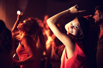 Image showing Music, woman and portrait at festival with dancing for party, concert and nightclub with happiness and audience. Disco, psychedelic event and performance show with entertainment, crowd and energy